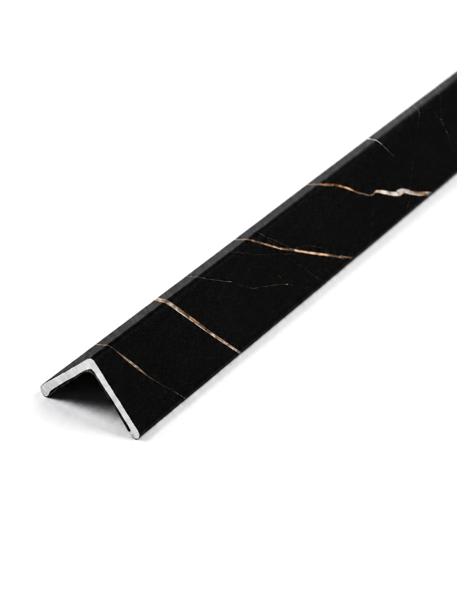 Noir Royale black corner trim with gold-toned veining and an L-shaped profile