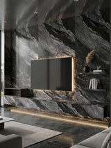 Modern media wall clad in black Noir Vein PVC panels with gray veining and a mounted TV