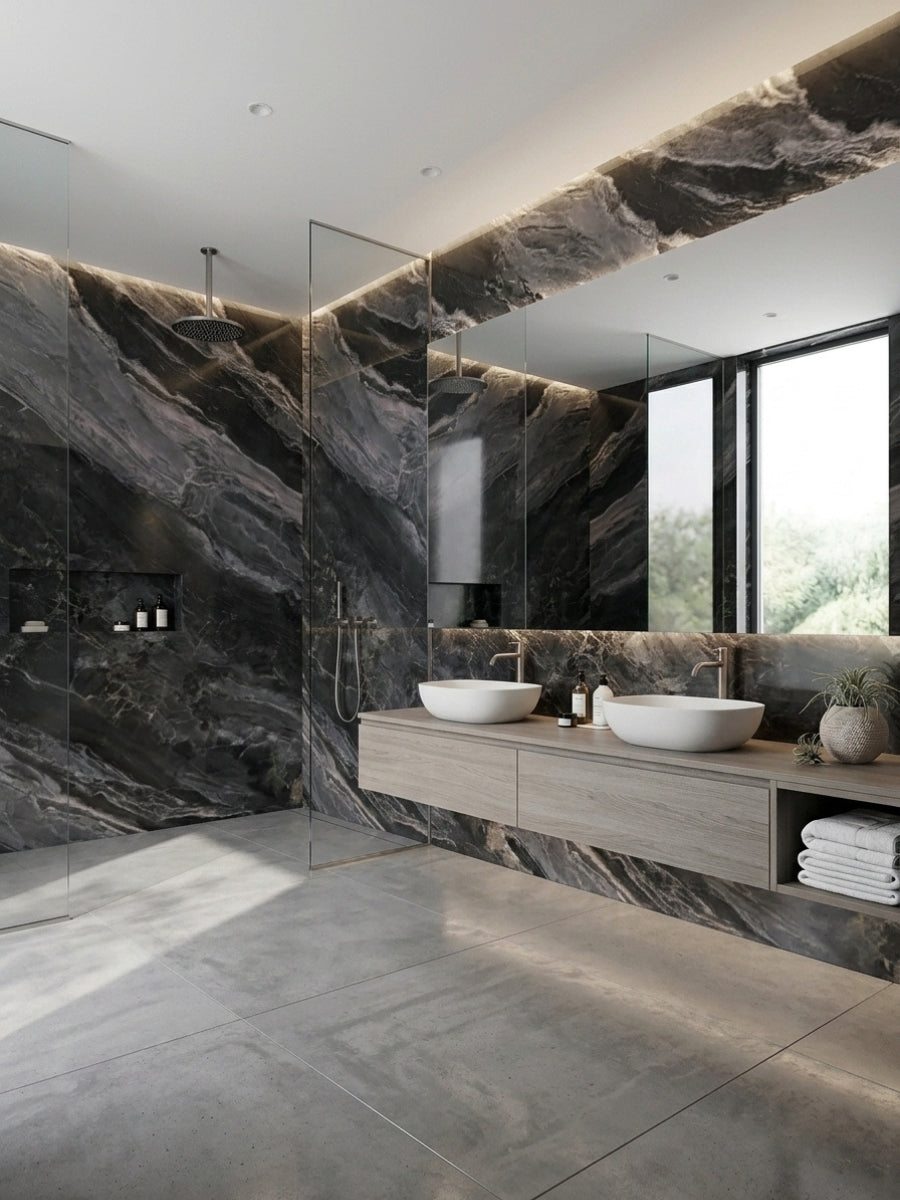 Luxury bathroom clad in Noir Vein black marble-look wall panels around the shower and double vanity
