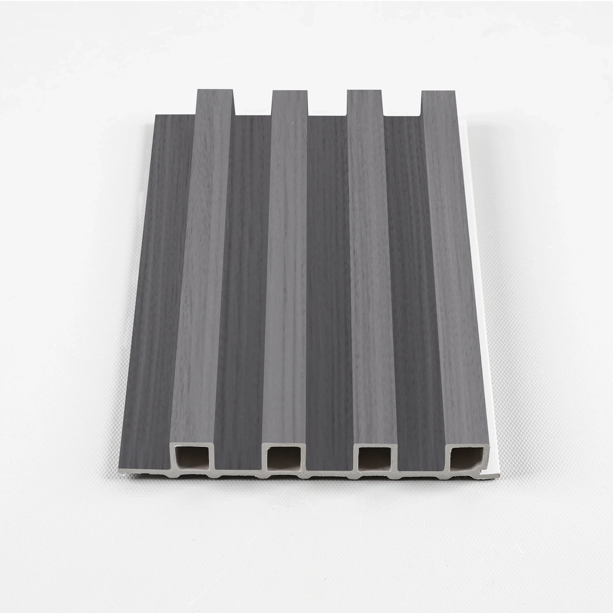 Oak gray WPC slat fluted wall panel sample with a medium gray wood-grain finish