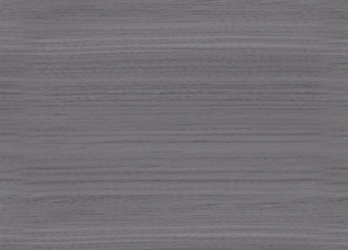 Close-up of the oak gray wood-grain texture on a WPC wall panel