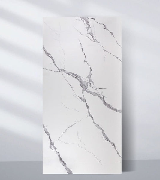 Upright 4x8 ft Calacatta Belga PVC marble wall panel with a white surface and bold gray veining