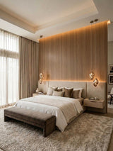 Royal Oak wood veneer paneling with vertical grain on a warmly lit modern bedroom feature wall