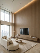 Floor-to-ceiling Royal Oak wood veneer panels behind a wall-mounted TV in a modern living room