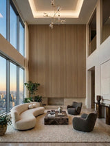 Royal Oak wood veneer panel feature wall in a double-height living room with large city-view windows