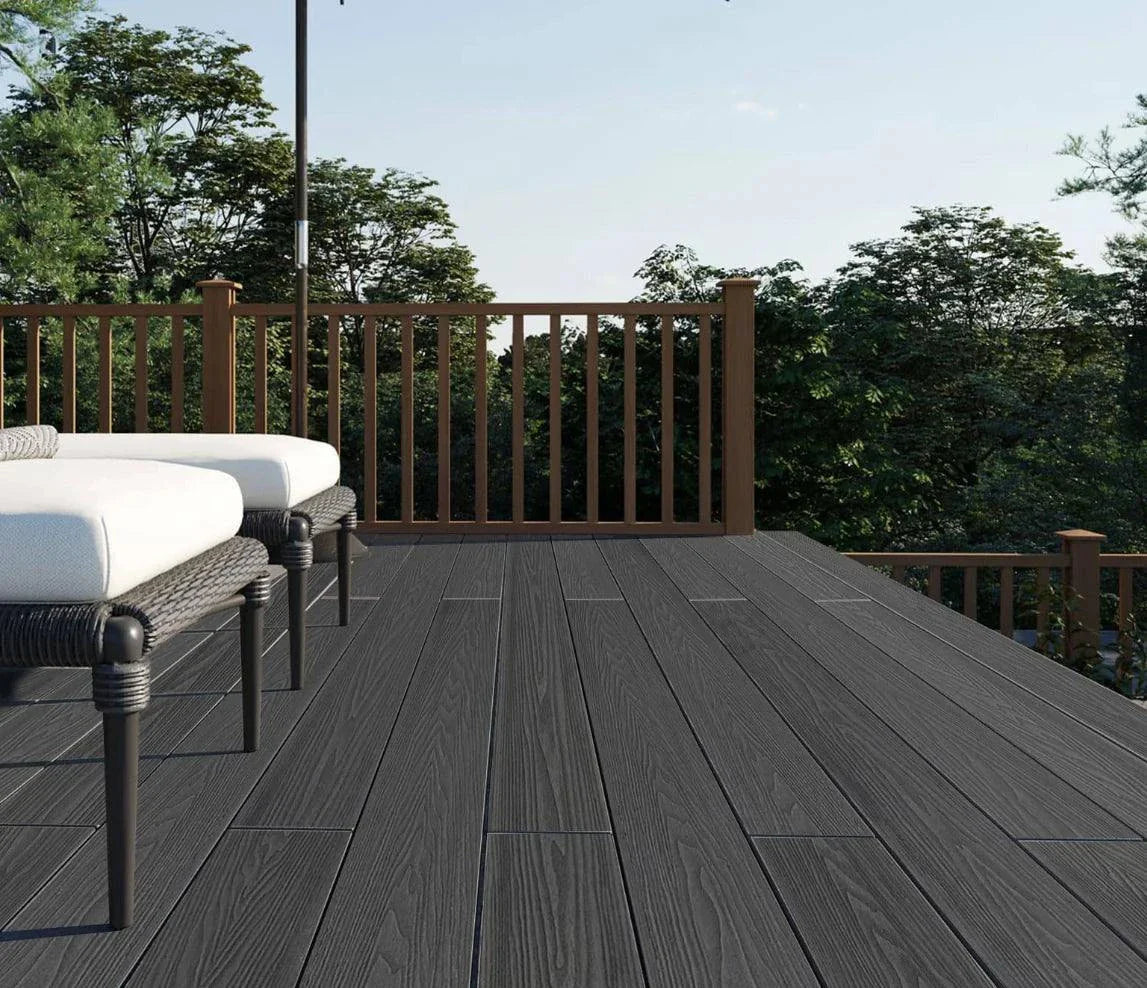 Dark gray co-extruded composite decking with brown wooden railing