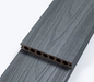 Dark gray composite deck board with wood grain texture