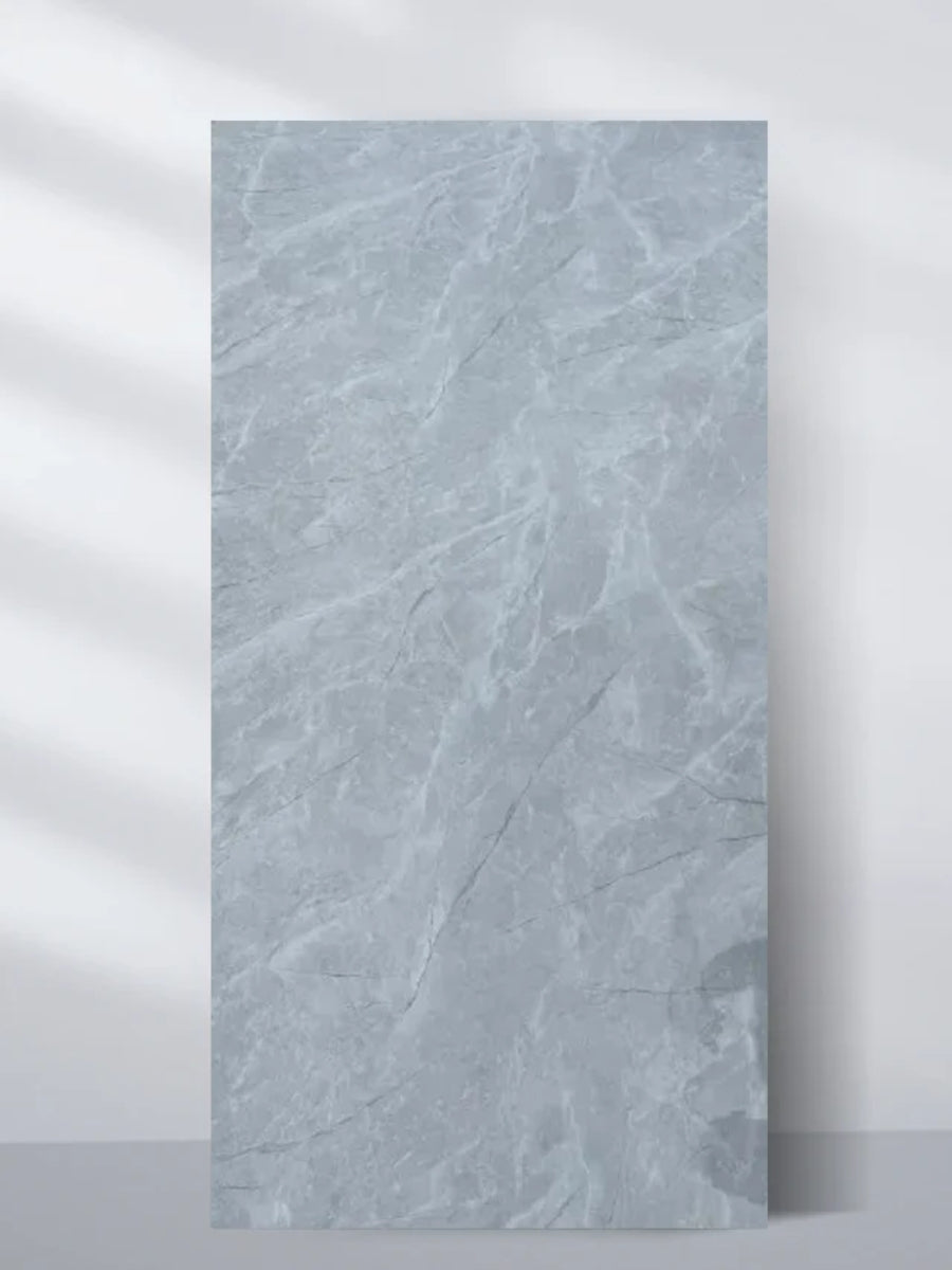 Serene Stone Marble PVC wall panel with a soft blue-gray marble pattern in a 4 x 8 ft sheet