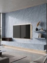 Modern TV wall clad in Serene Stone Marble blue-gray PVC panels with matching low cabinetry