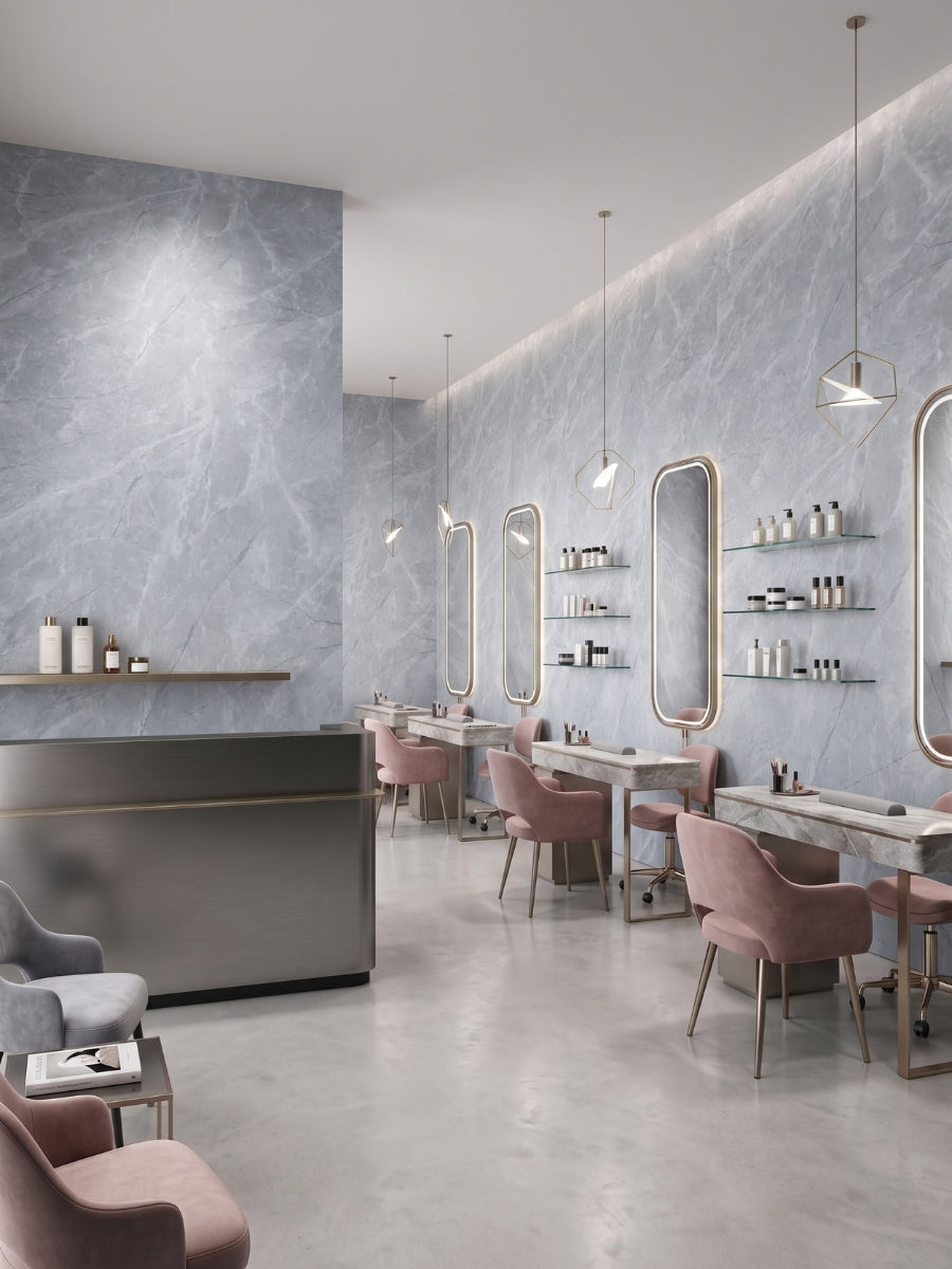 Blue-gray Serene Stone Marble PVC wall panels installed behind mirrors and styling stations in a modern salon
