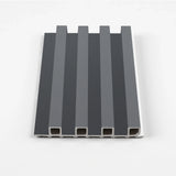 Silver gray WPC slat fluted wall panel sample with a dark metallic-look finish