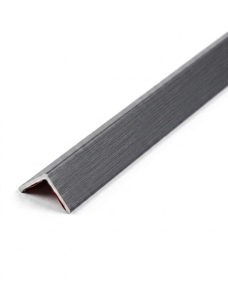 L-shaped acoustic and fluted wall panel trim with a dark gray linear finish