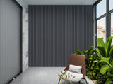 Silver gray metallic WPC fluted 3D accent wall on an enclosed balcony with a lounge chair and plants
