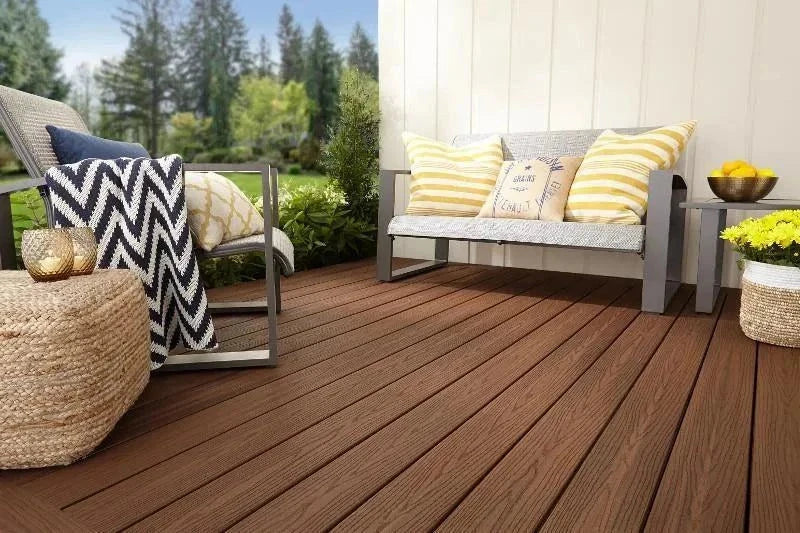 Teak composite decking board in reddish-brown