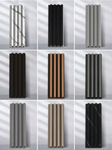 Grid of WPC slat fluted wall panel samples in assorted wood, black, gray, white and marble-look finishes