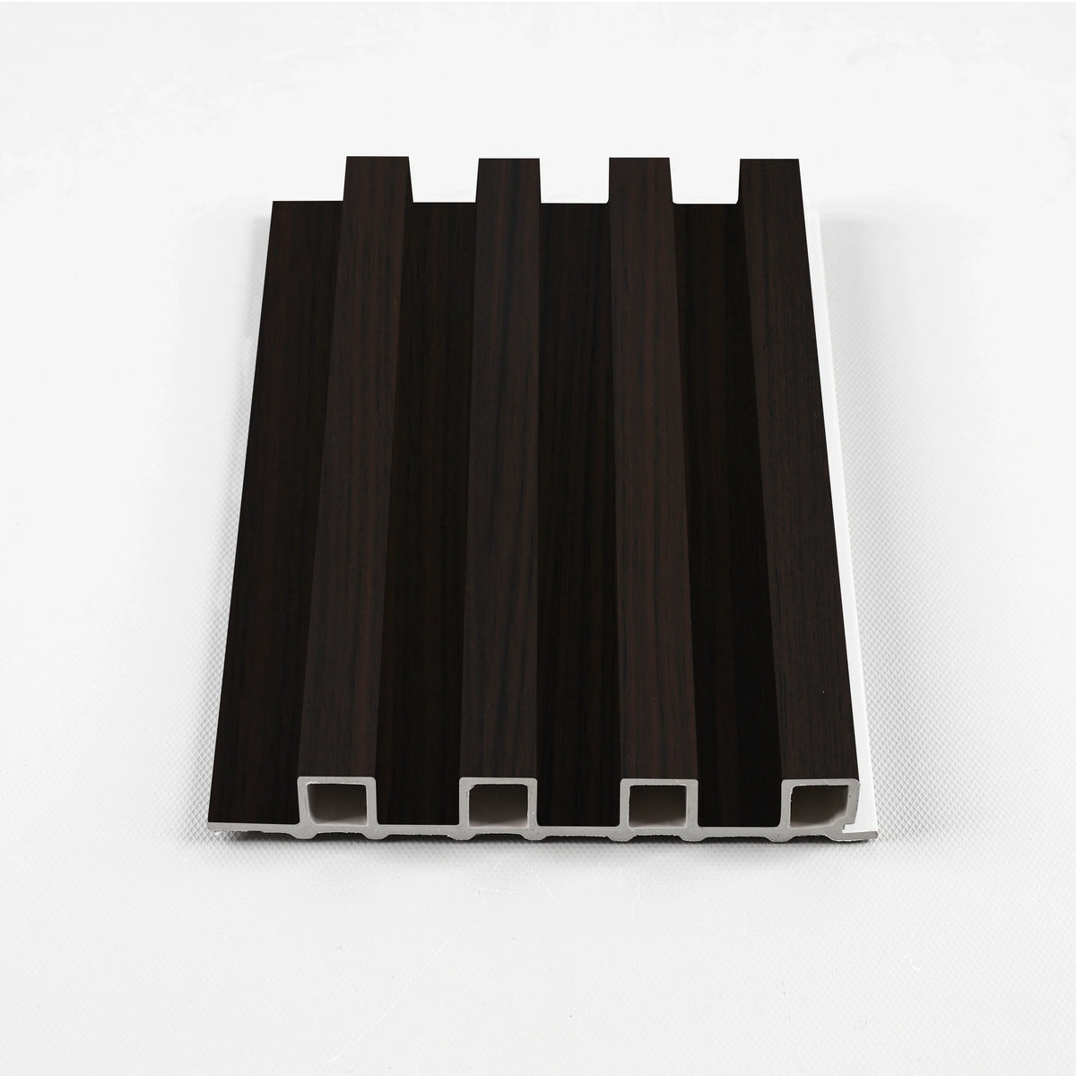 Walnut Ink WPC fluted wall panel sample with very dark brown wood grain
