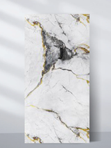 White PVC marble sheet sample with black stone-like accents and fine gold veining