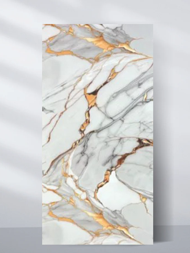 PVC marble sheet sample with dramatic gold and gray veins across a white surface