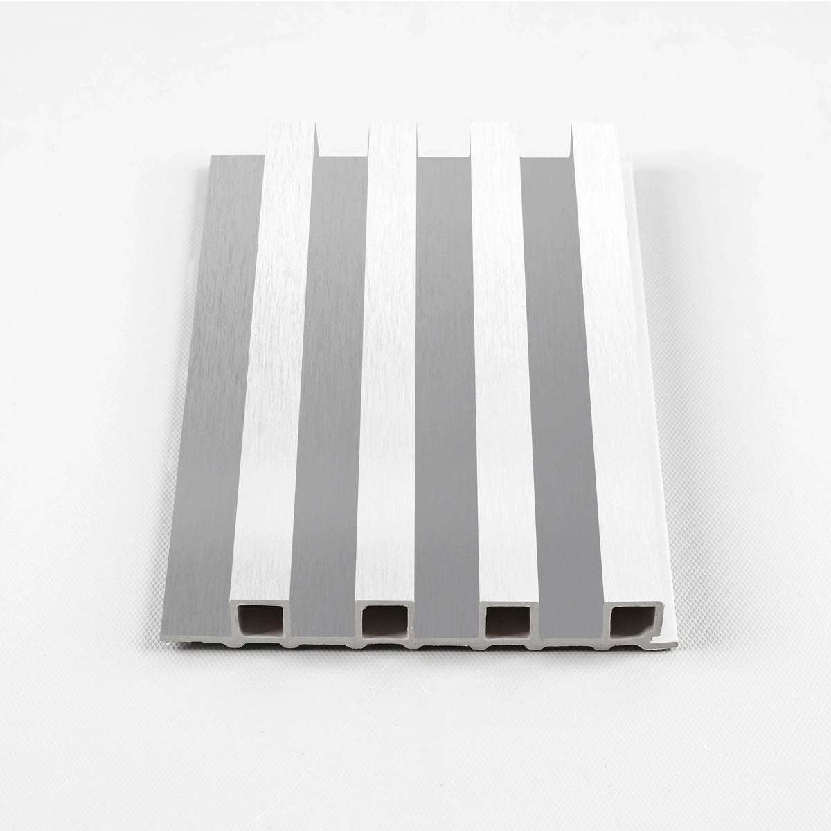 White brushed WPC slat fluted wall panel sample with alternating raised ribs and grooves