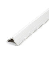 L-shaped acoustic and fluted wall panel trim with a white linear finish