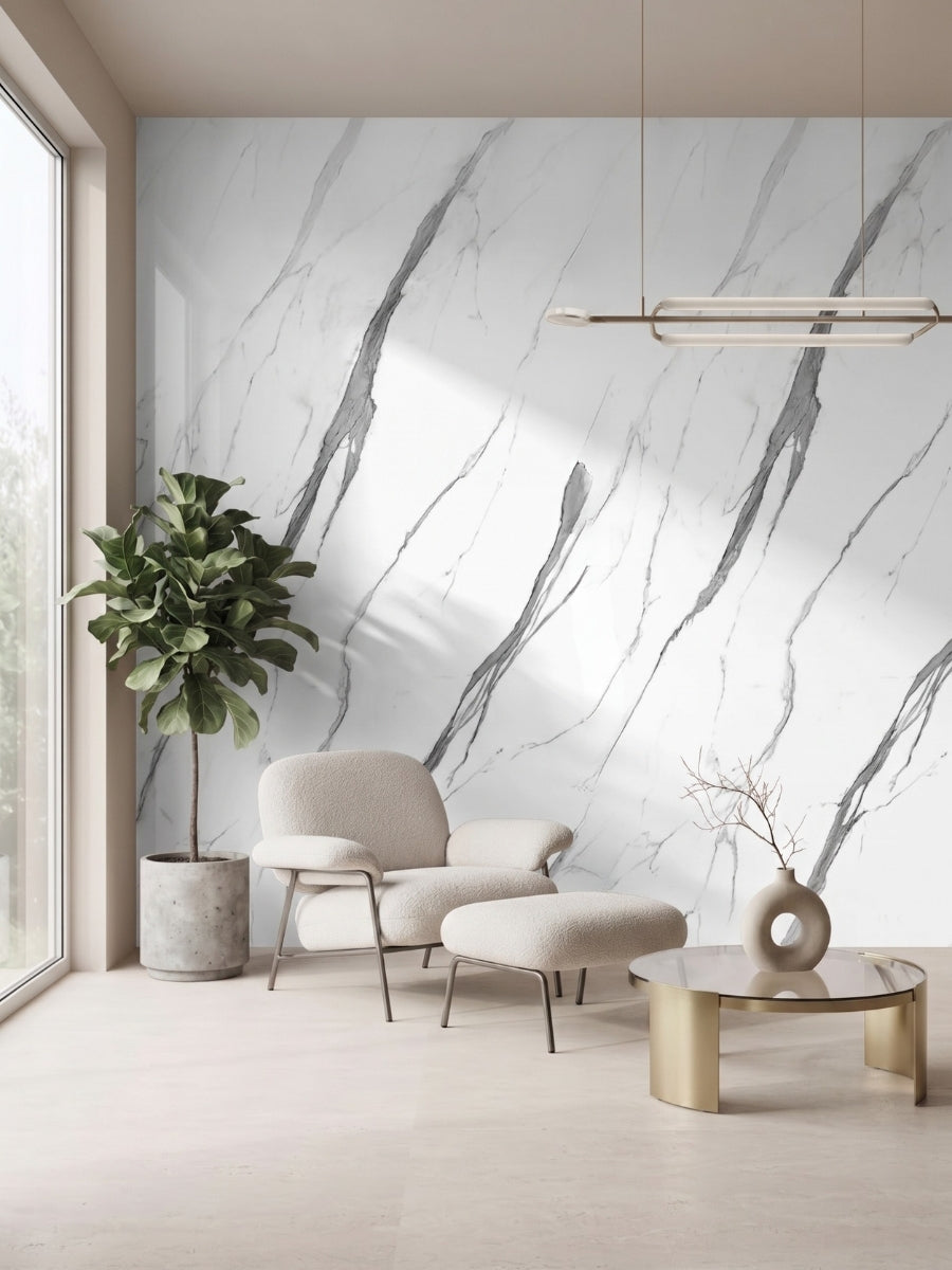 White matte marble PVC wall panels with bold gray veining in a lounge with an armchair and indoor plant