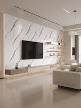 White marble-look PVC wall panels installed as a modern living room TV feature wall