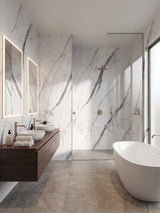 White matte marble PVC wall panels lining a modern bathroom with a glass-enclosed shower and freestanding tub