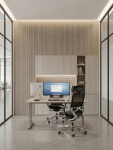 White oak WPC fluted wall panels behind a desk and built-in cabinets in a modern office