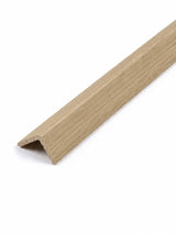 Matching white oak-finish corner trim with an angled profile