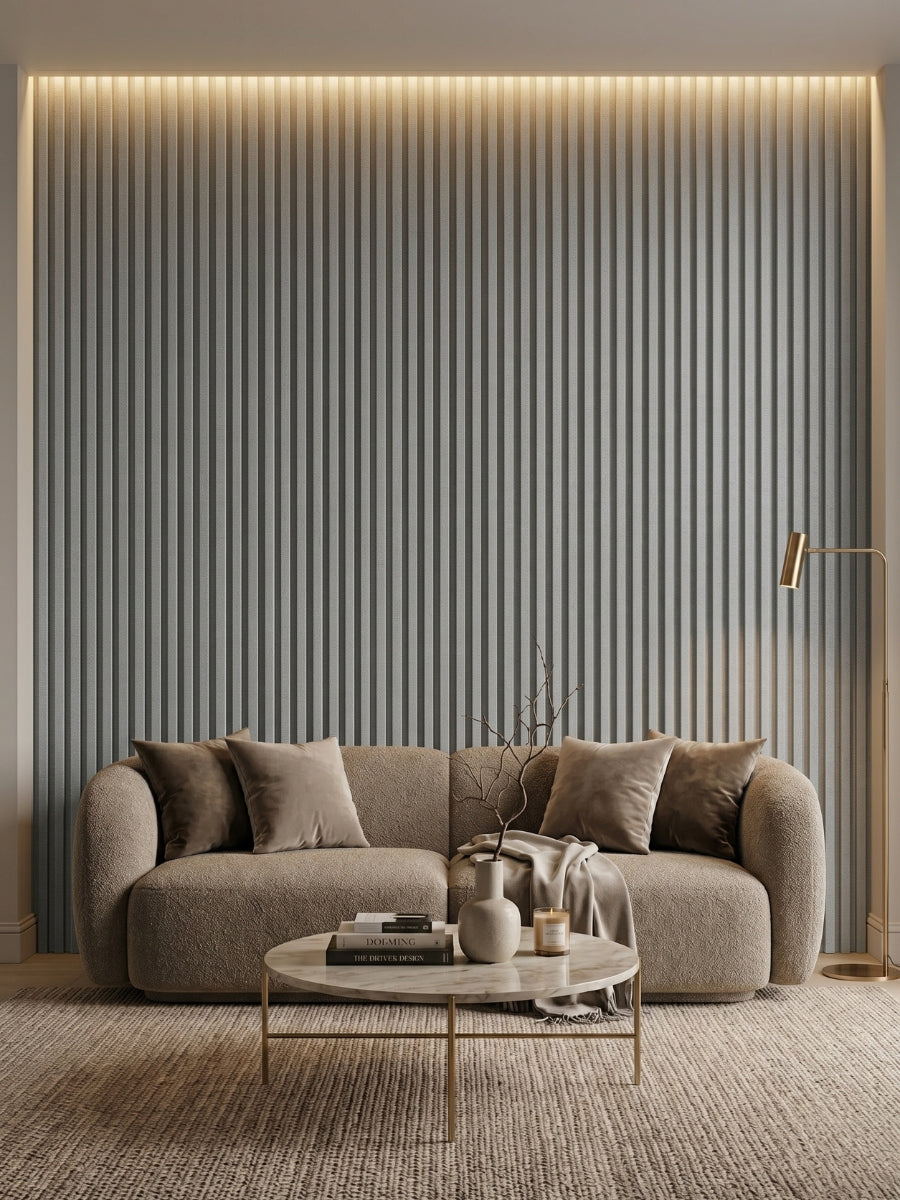 White linen fluted 3D wall panel accent wall behind a curved sofa and round coffee table