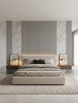 White linen WPC fluted panels paired with marble-look sections on a modern bedroom feature wall