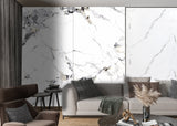 Glacier Vein white marble-look wall panel displayed behind neutral sofas in a contemporary living room