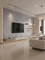 Ash gray marble PVC TV wall with a floating console and illuminated display shelves in a modern living room