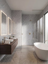 Ash gray marble PVC wall panels surrounding a modern bathroom vanity, walk-in shower, and freestanding tub