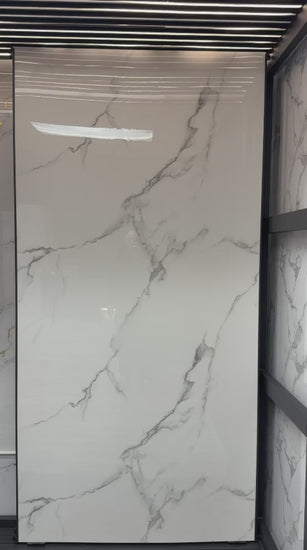 Calacatta White marble PVC wall panel installed on luxury interior wall, UV protected waterproof 4x8 ft