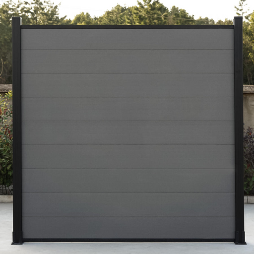 Light gray co-extrusion composite fence with horizontal planks and black metal posts