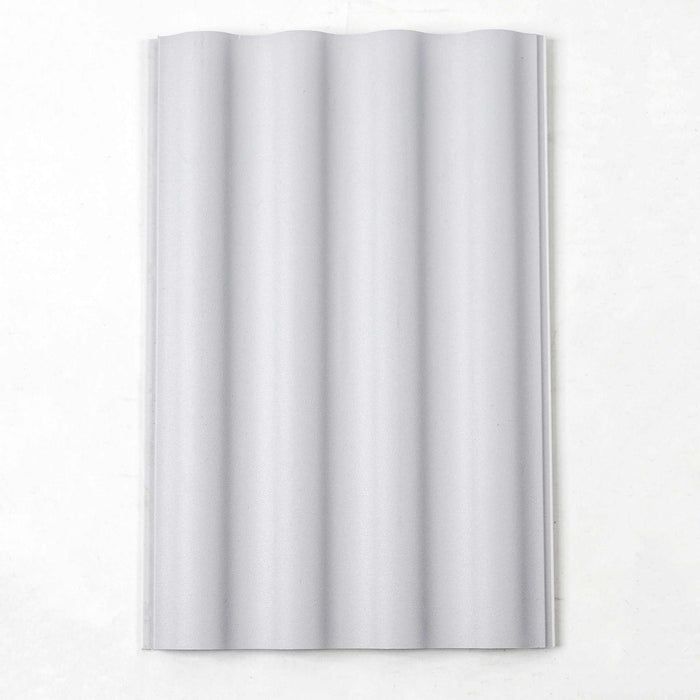 Light grey corrugated WPC wall panel with a wavy pattern