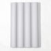 Light grey corrugated WPC wall panel with a wavy pattern