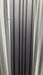 Matte black WPC wall panel with textured carbon fiber finish