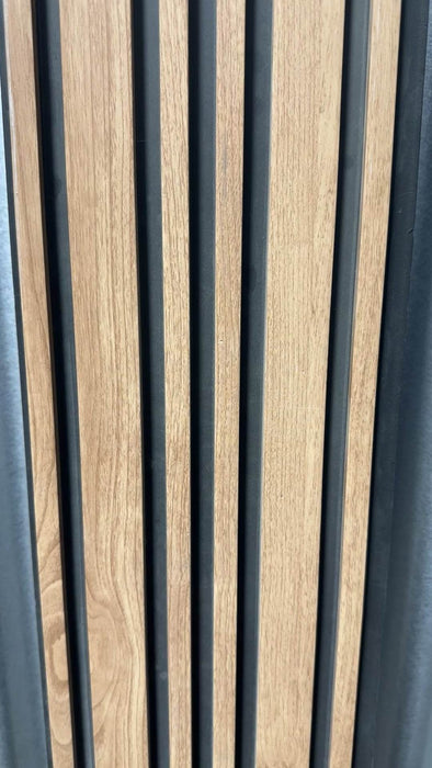 Stylish WPC wall panel with light brown vertical planks and black horizontal stripes