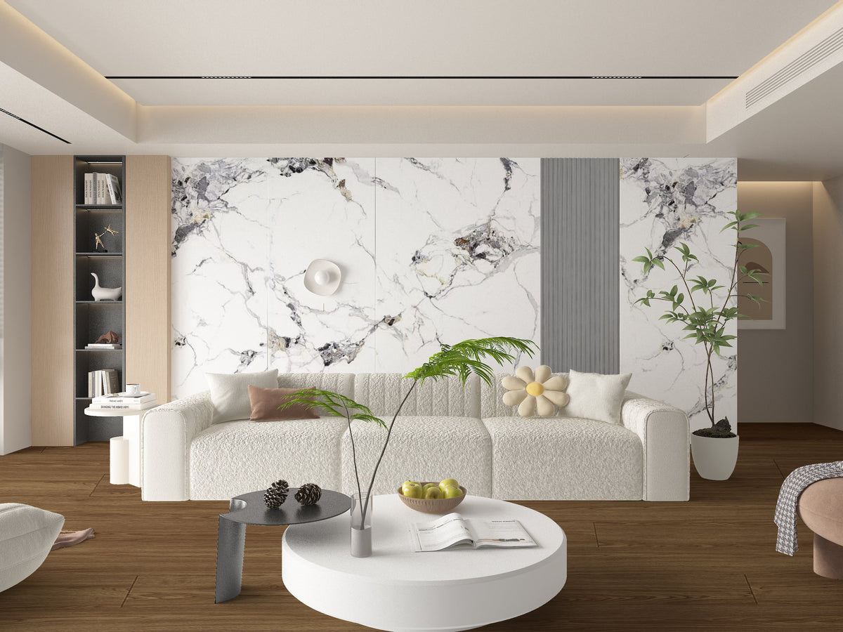 Modern living room with Glacier Vein marble-look PVC wall panels behind a curved white sofa