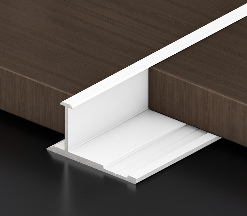 White 3mm aluminum H-joint connection trim positioned between dark wood-look PVC wall panels