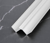 White 3mm aluminum inside corner trim profile close-up on dark marble
