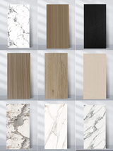Selection of nine wood veneer wall panel samples in wood-grain, black, and marble-look finishes