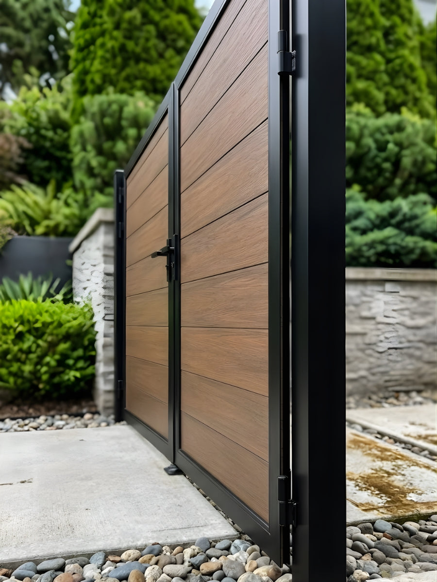 Side view of brown WPC double fence gate showing the black frame, hinges and horizontal slats