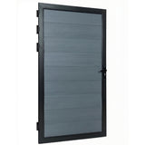 Angled view of light gray WPC fence gate with black frame, hinges and handle