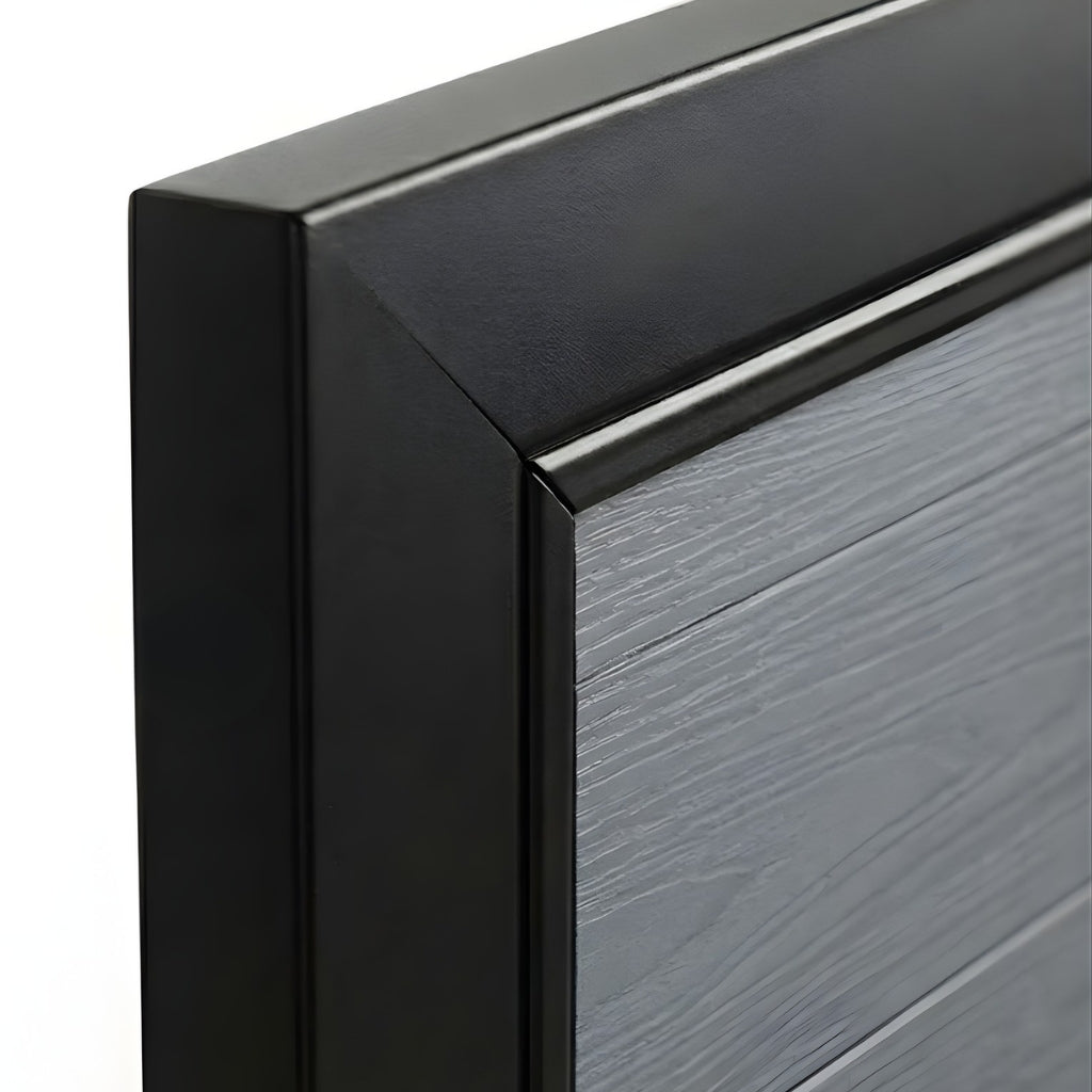 Close-up of black frame corner and textured light gray panel on WPC fence gate