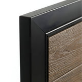 Close-up of the black frame corner and textured brown wood-grain WPC gate panel