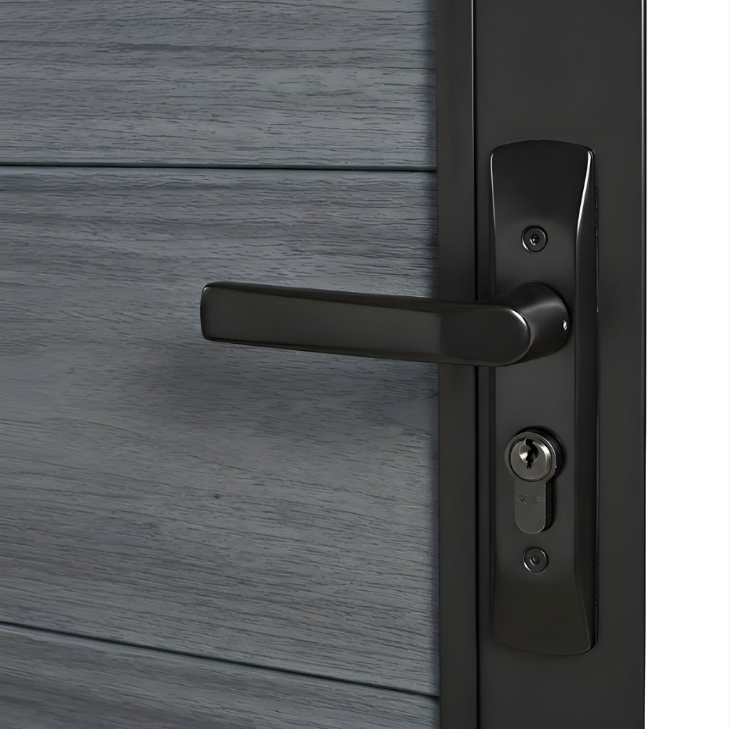 Close-up of black lever handle and keyed lock on light gray WPC fence gate