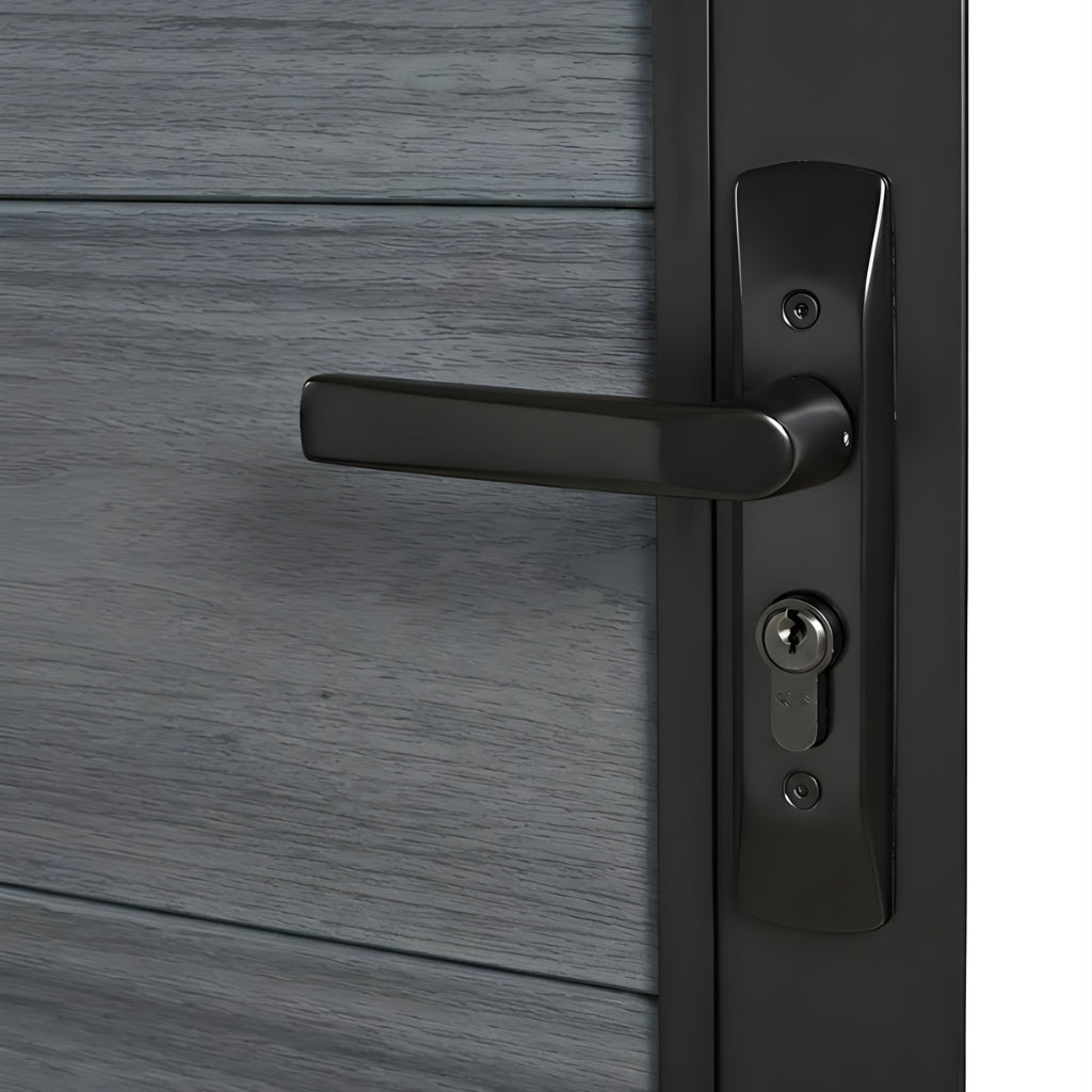 Close-up of the black lever handle and keyed lock on a gray WPC fence gate